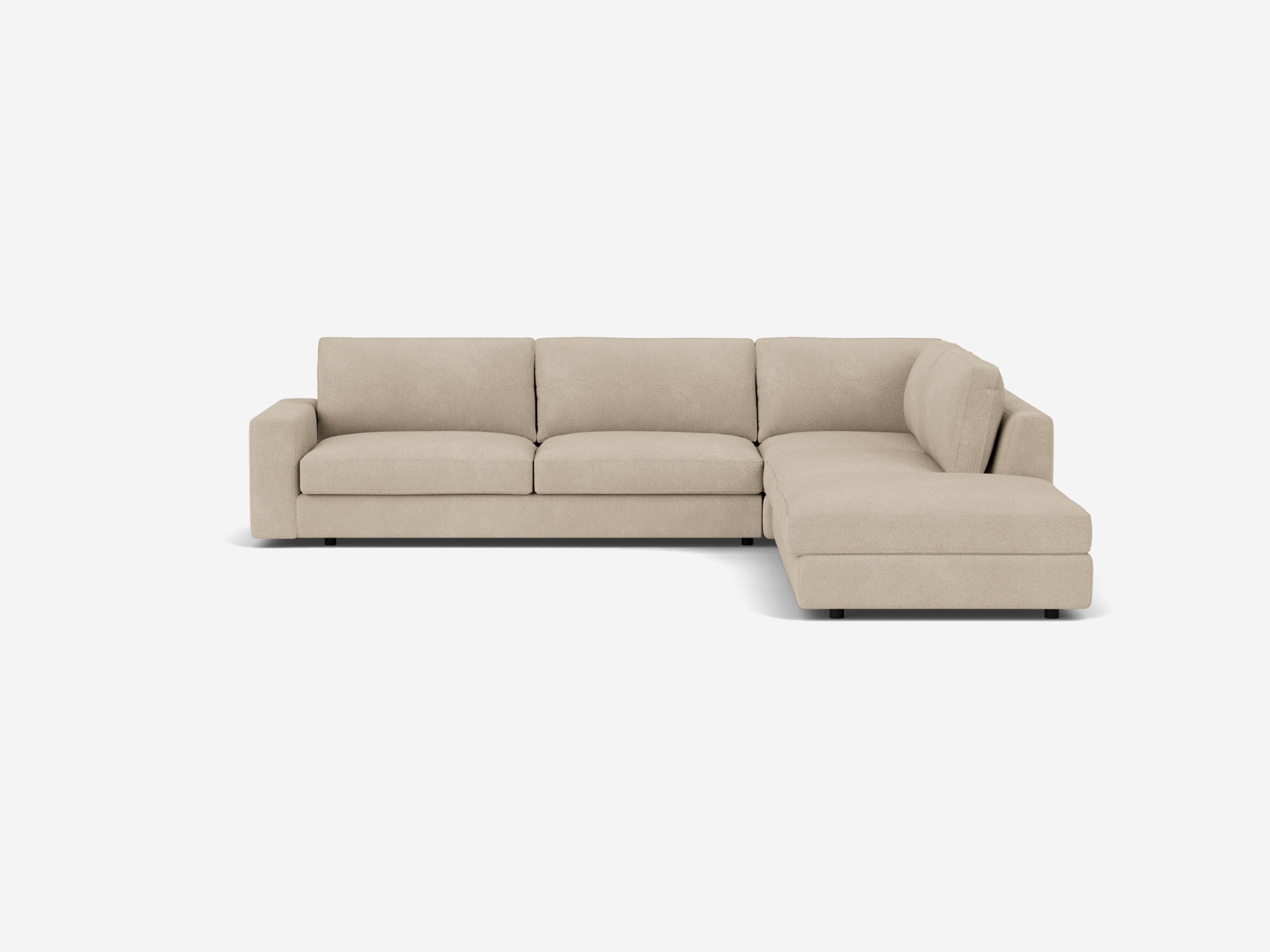 Front view of the Cello modern sectional couch in light biege fabric with right hand backless chaise